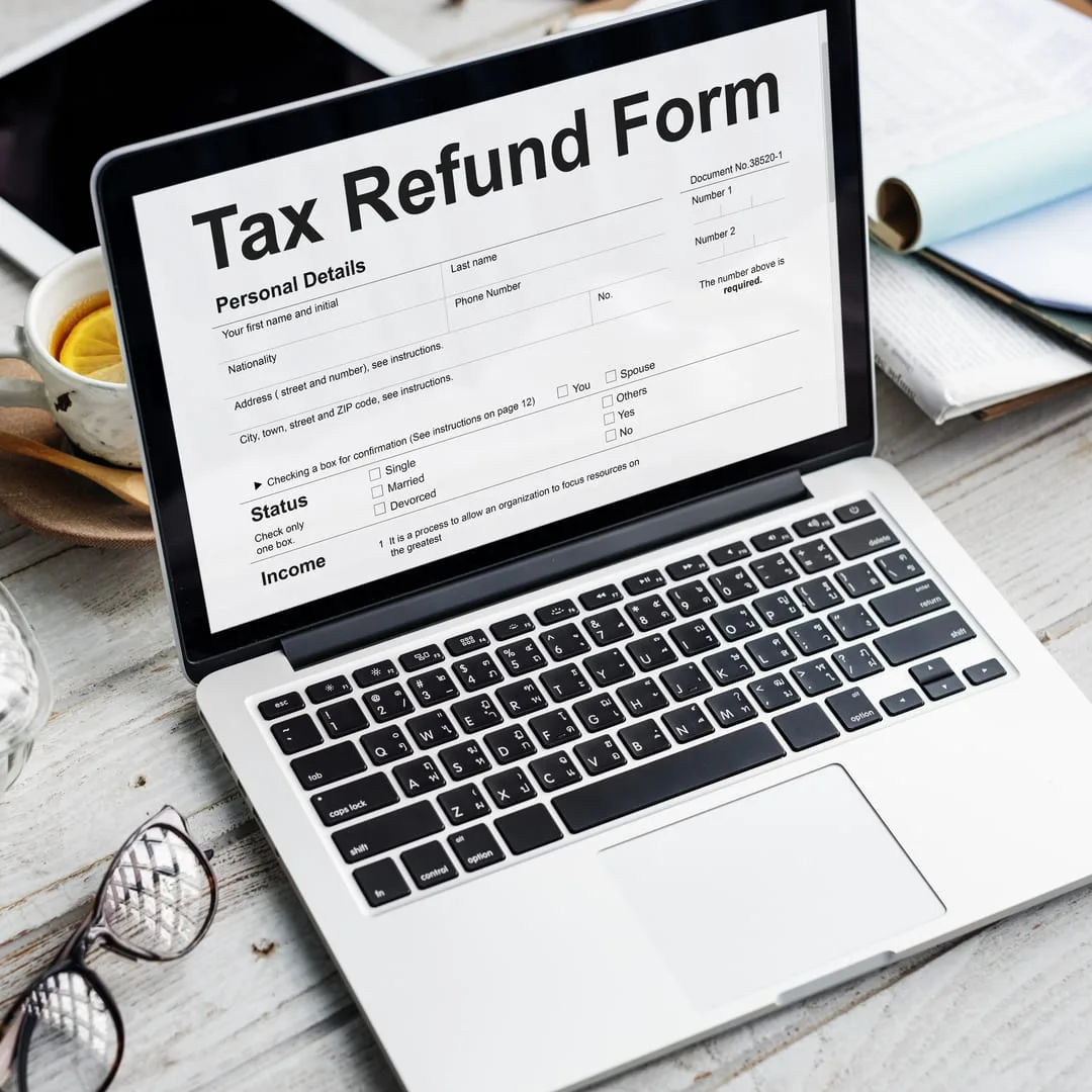 taxes impuestos manuel gallardo reembolsotax-refund-form-laptop-screen Preparación de Impuestos Consultoría Fiscal Asesoría Financiera